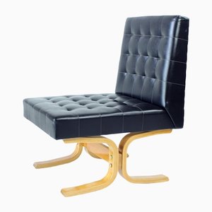 Mid-Century Lounge Chair in Black by Jindrich Volak for Drevopodnik Holesov, 1960s
