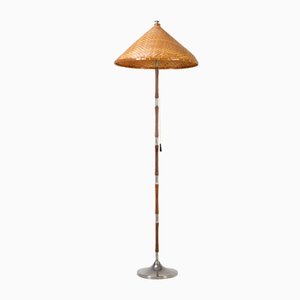 Lámpara de pie Mid-Century de teca y ratán, años 60