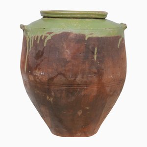 Vaso antico in terracotta con manici