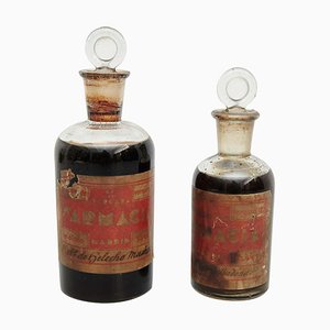 Botellas de farmacia de vidrio, principios del siglo XX. Juego de 2