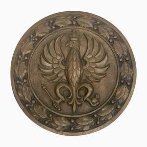 Aquila su lastra di bronzo con stemma, 1925