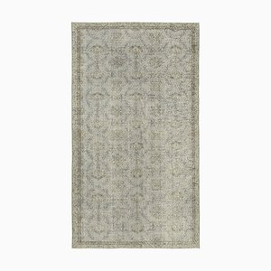 Tappeto vintage sovratinto grigio