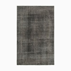 Schwarzer Überfärbter Teppich