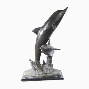 Estatua de delfín vintage de bronce