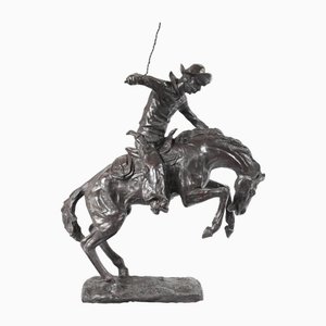 Bronzene Remington Horse and Cowboy Bronco Buster Statue