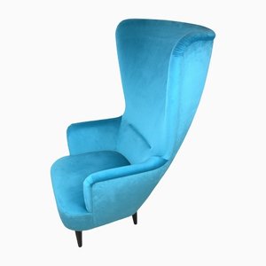Velvet Lounge Chair in the style of Tom Dixon