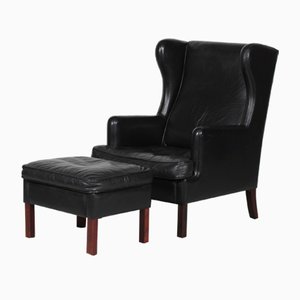 Danish Modern Wing Chair and Stool with Black Leather in Kaare Klint Style, 1970s, Set of 2
