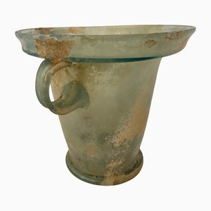 Recipiente de vidrio romano antiguo