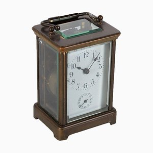 Reloj de viaje de vidrio y bronce, siglo XIX