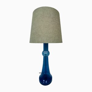 Lámpara de mesa de vidrio azul atribuida a Nanny Still para Raak, años 70