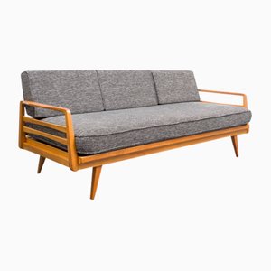 Sofá cama de madera de cerezo de Knoll Antimott, años 60