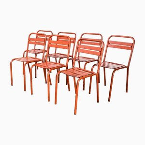 Französische Esszimmerstühle aus rotem Metall im Stil von Tolix, 1950er, 7er Set