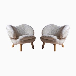 Pelican Chairs in Sheep Skin and Wood by Finn Juhl, Set of 2