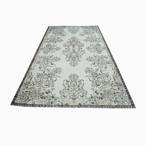 Türkischer Vintage Teppich mit floralem Muster in Beige