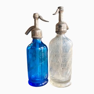 Botellas de vidrio Seltzers pequeñas de vidrio azul, década de 1890. Juego de 2