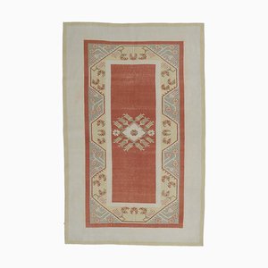 Türkischer Vintage Teppich in Pastellbeige & Korallenrot