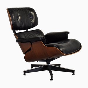 Lounge Chair in Black Leather and Rosewood by Charles & Ray Eames for Herman Miller, 1970s