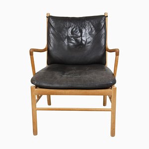 Colonial Chair in Oak and Black Aniline Leather by Ole Wanscher, 1940s