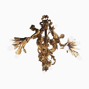 Lámpara de araña estilo Luis XVI de bronce dorado