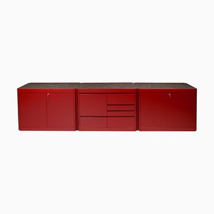 Mueble de almacenamiento de madera lacada en rojo y granito atribuido a Alessandro Mendini, años 80. Juego de 3