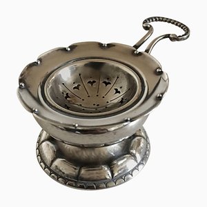Colador de té de plata esterlina y soporte para colador de té de Georg Jensen, años 30. Juego de 2
