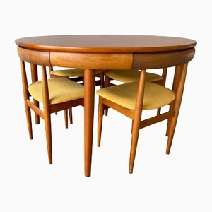 Tavolo da pranzo rotondo allungabile in teak con sedie abbinate di Hans Olsen per Frem Rojle, fine XIX secolo