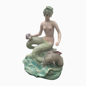 Bicauda Mermaid with Shell on Rock and Mythological Fish