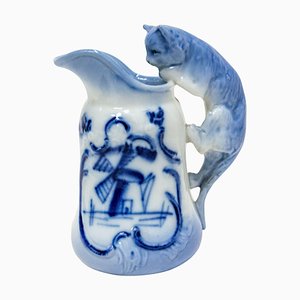 Jarra de leche holandesa en miniatura de fayenza con asa de gato, finales del siglo XIX