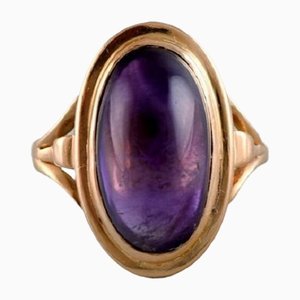 Art Deco Swedish 18 Karat Gold Ring with Purple Stone