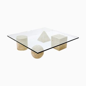 Mesa de centro Metaphor de travertino y vidrio atribuida a Massimo & Leilla Vignelli, años 80