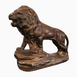 Figura de león antigua de escayola