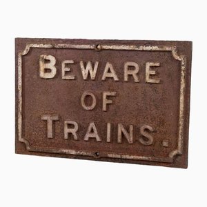 Señal de ferrocarril Beware of Trains de hierro fundido, años 30