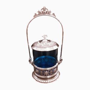 Caja de galletas alemana con marco de metal plateado decorado e inserto original de vidrio azul de WMF, 1900