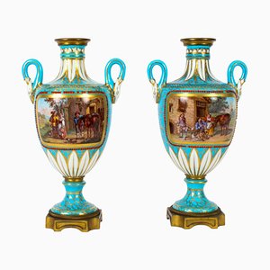 Urnas francesas de porcelana, siglo XIX. Juego de 2