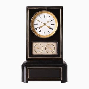 Reloj de repisa con calendario, década de 1850