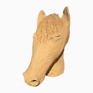 Escultura de cabeza de caballo de cerámica