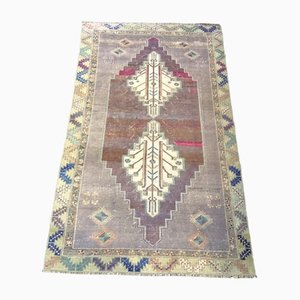 Alfombra Oushak turca vintage morada hecha a mano