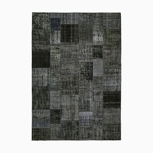 Schwarzer Vintage anatolischer Teppich aus Baumwolle