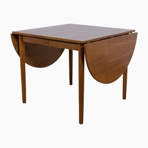 Mesa de comedor extensible danesa de teca, años 60