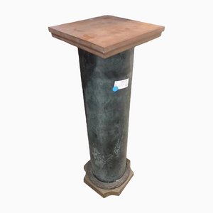 Columna de mármol con base de bronce