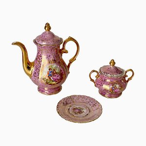 Servicio de té alemán de porcelana rosa y color, años 50