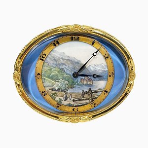 Orologio da scrivania ovale in ottone dorato con paesaggio dipinto, Svizzera, fine XIX secolo