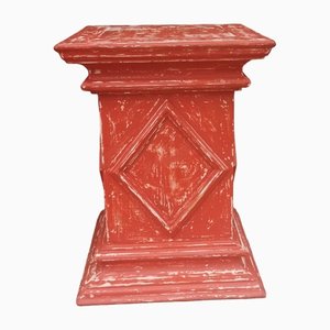 Soporte antiguo de madera roja