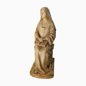 Figura de monja francesa patinada que lee los Evangelios de finales del siglo XIX