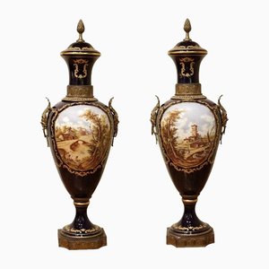 Napoleon III Blue Royal Lidded Vases Hand Painted Landscapes and Bronze Handles, Set of 2