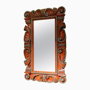 Espejo con marco de estilo renacentista italiano tallado y nogal lacado