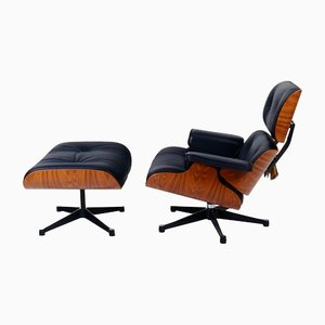 Modell 000/999 Lounge Chair & Ottoman in Rosewood & Leather by Charles & Ray Eames for Vitra, 2006, Set of 2