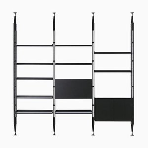 Librería modular Infinito de madera teñida en negro de Franco Albini para Cassina