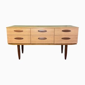 Credenza su gambe affusolate in teak con 6 cassetti