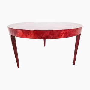 Mesa de comedor italiana de pergamino lacado en rojo atribuida a Aldo Tura, años 60